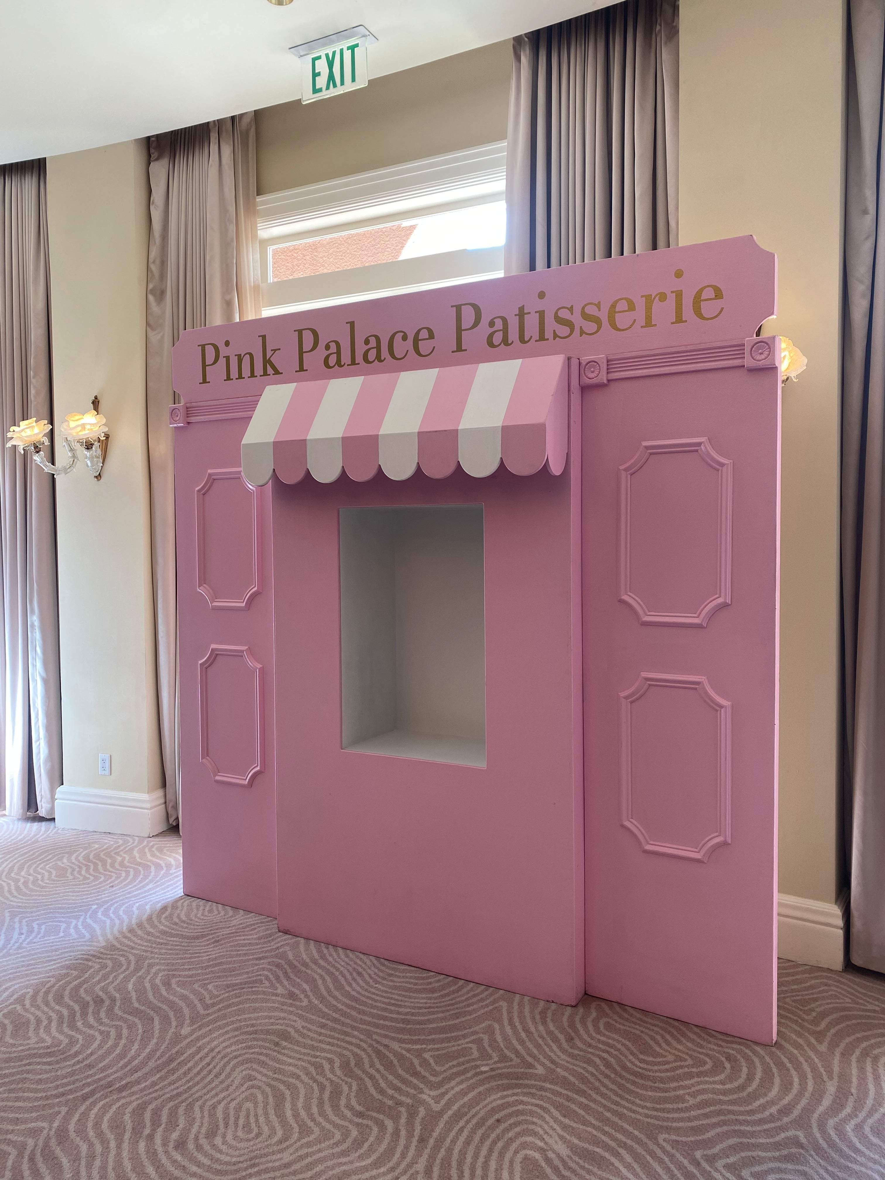 Light Pink Store Front With Custom Signage