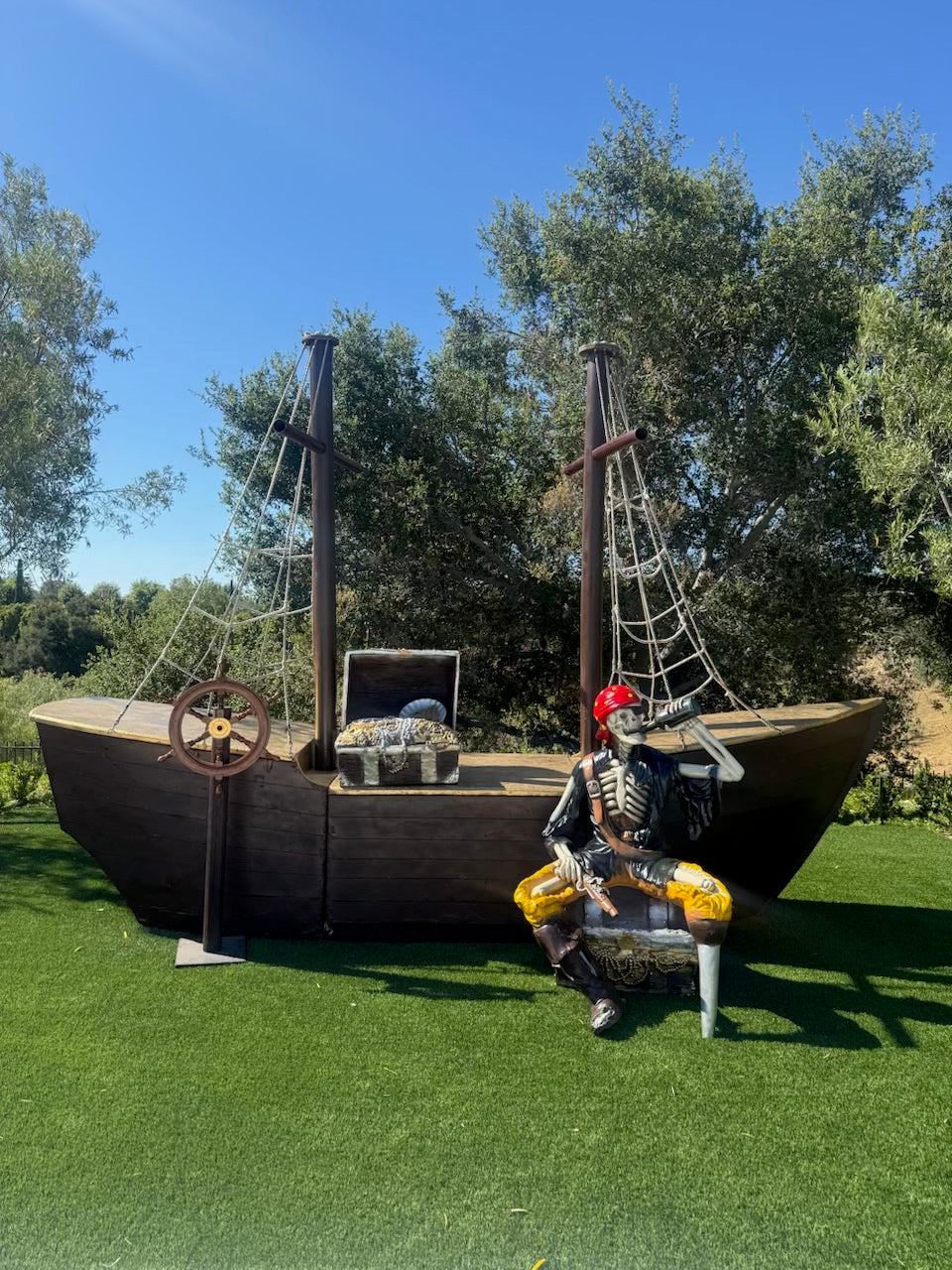 Pirate Skeleton Sitting on Treasure Chest