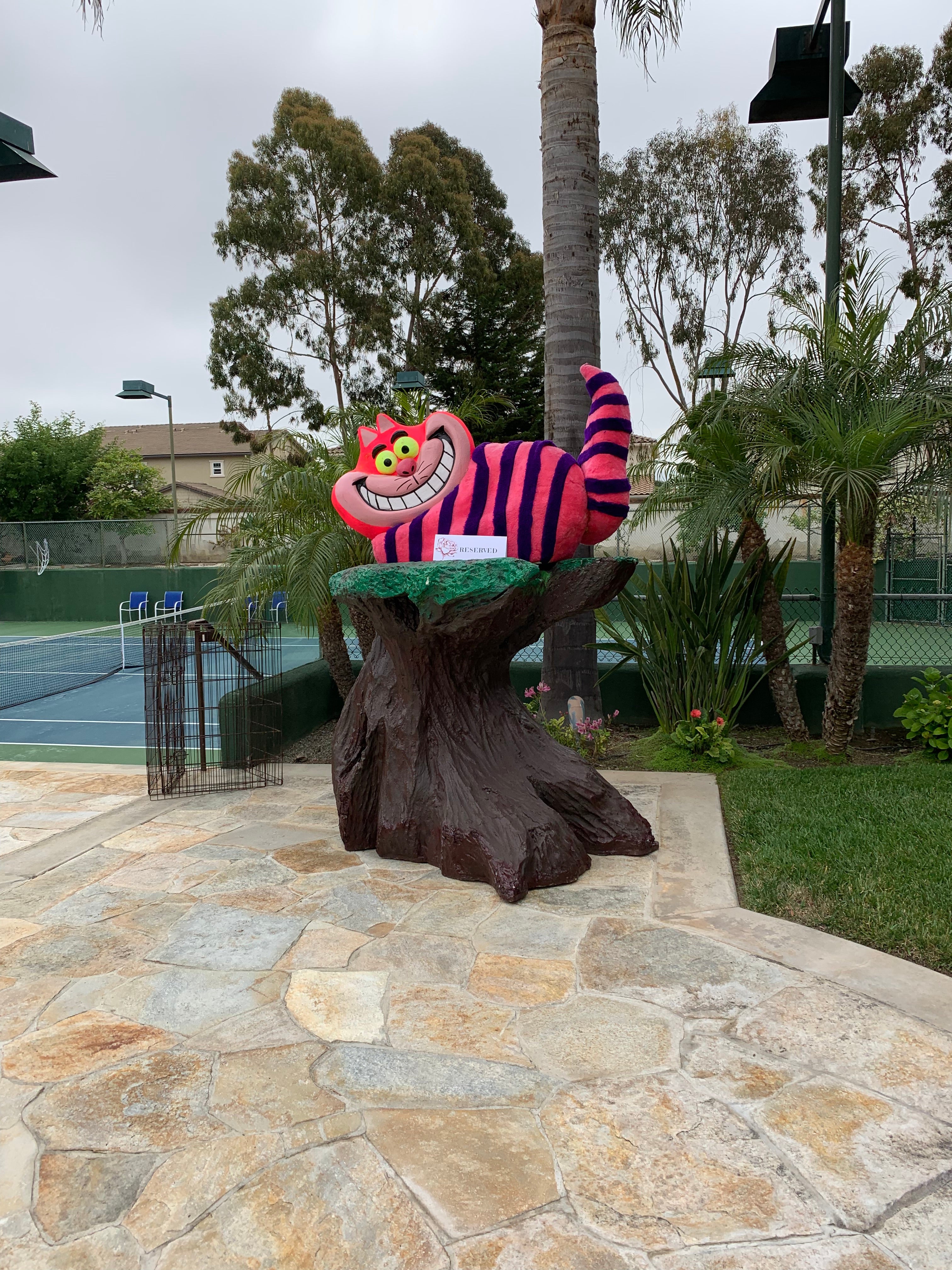 Cheshire Cat with Tree Stump