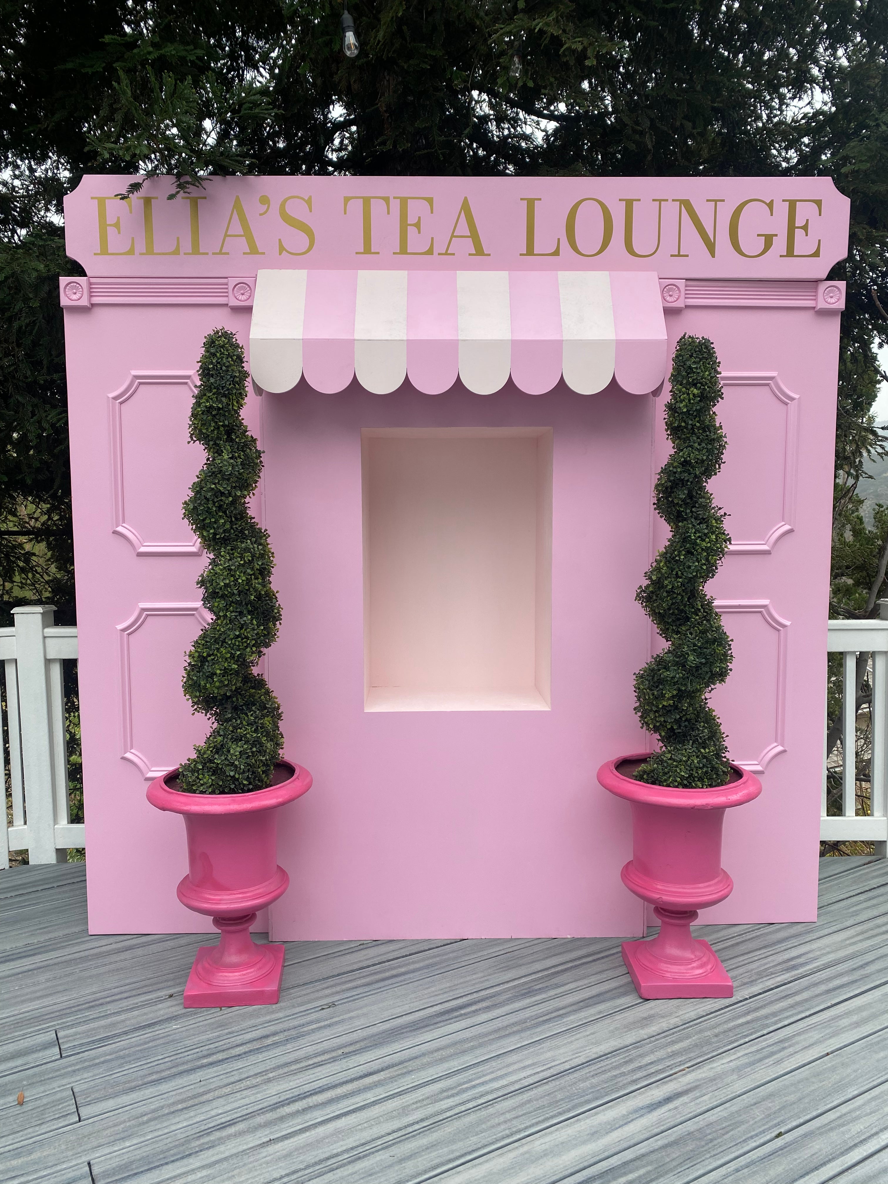 Light Pink Store Front With Custom Signage