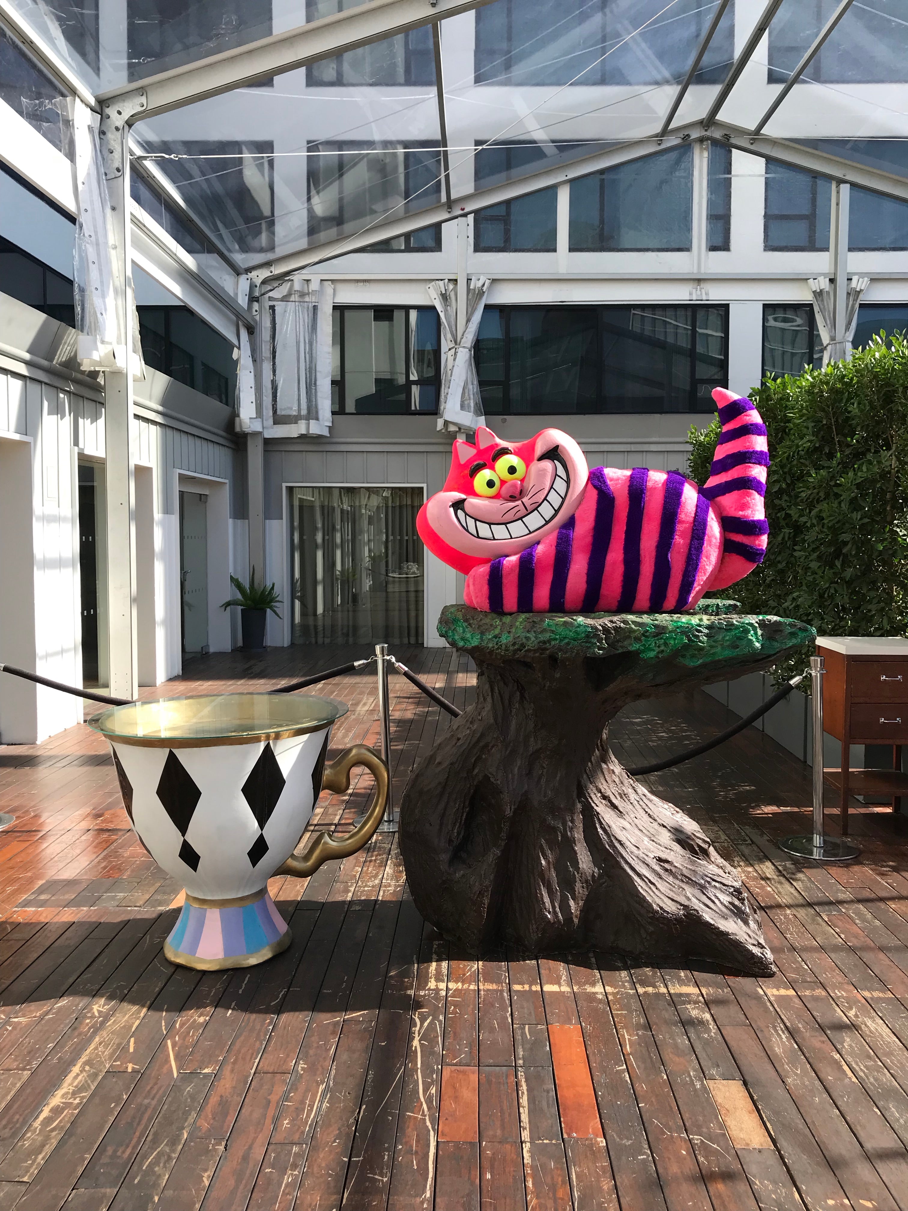 Cheshire Cat with Tree Stump